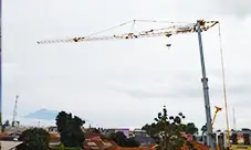 Potain HUP 32-27 self-erecting crane delivering reach and hook height where space is limited.